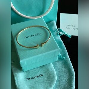 Authentic Tiffany & Co T Narrow Wire Bracelet - 18k Yellow Gold.